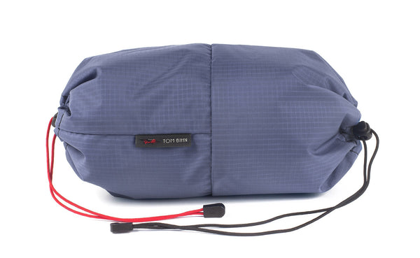 An Aeronaut 45 Travel Laundry Stuff Sack in Dusk (purplish-blue with light blue grid) 210 Cerylon.